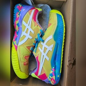 ASICS Yellow and Pink Athletic Shoes with Blue Accents